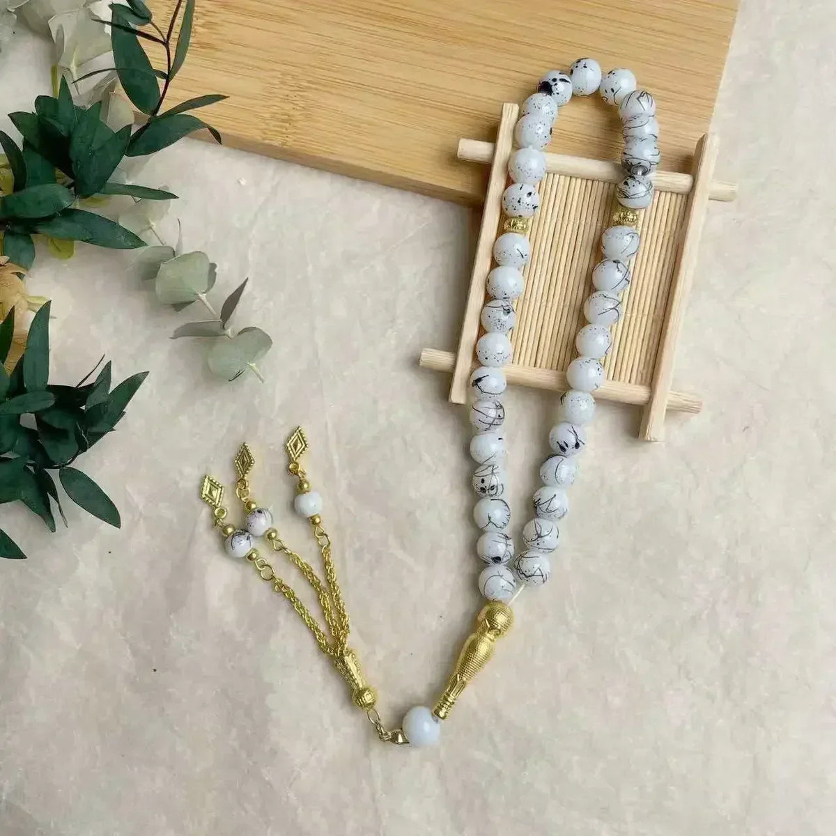 Tasbih med glasperler — 33 perler og guldkvast