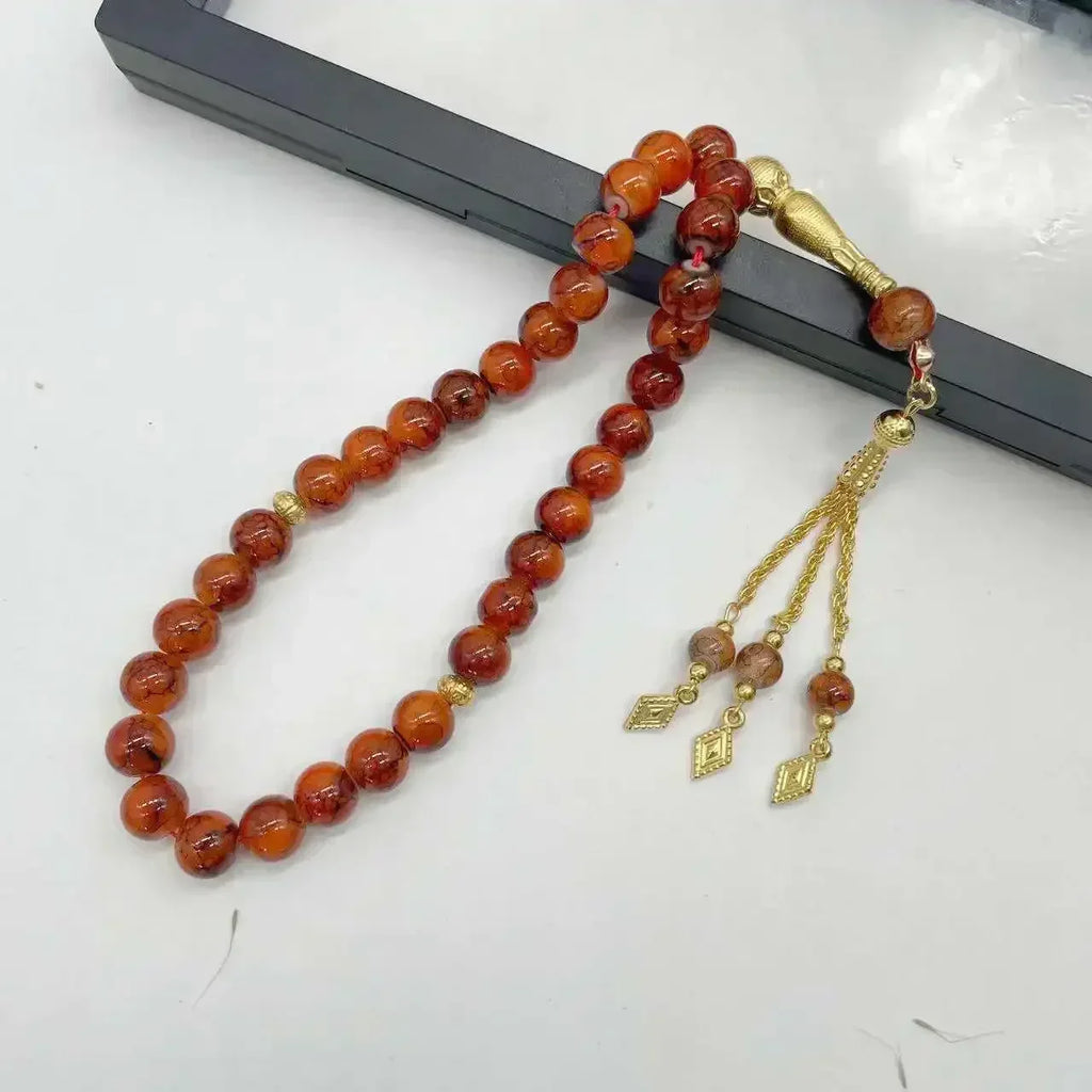 Tasbih med glasperler — 33 perler og guldkvast