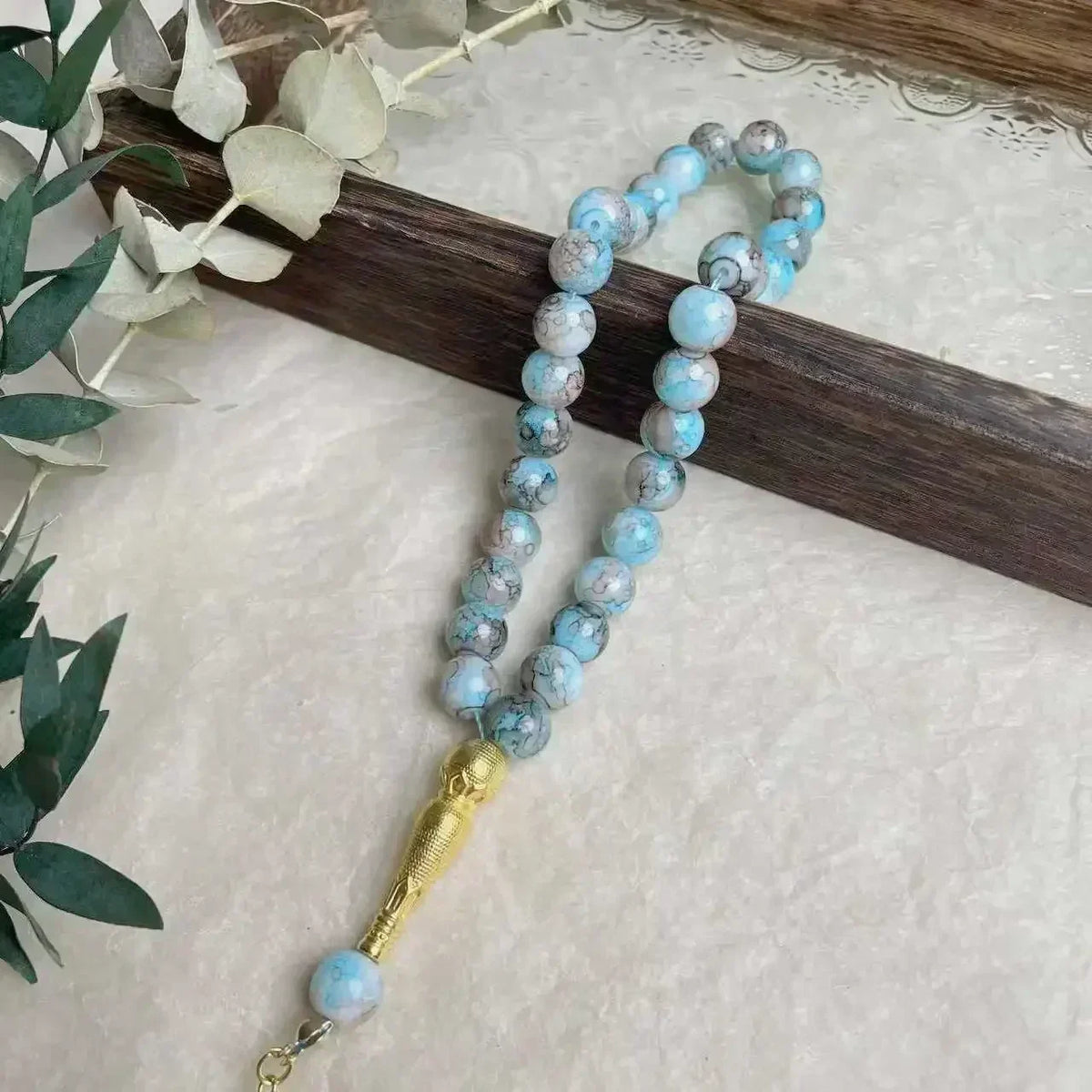 Tasbih med glasperler — 33 perler og guldkvast