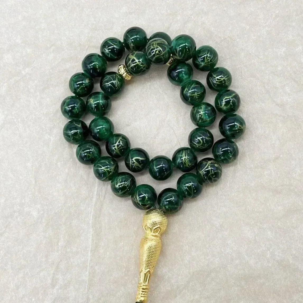 Tasbih med glasperler — 33 perler og guldkvast