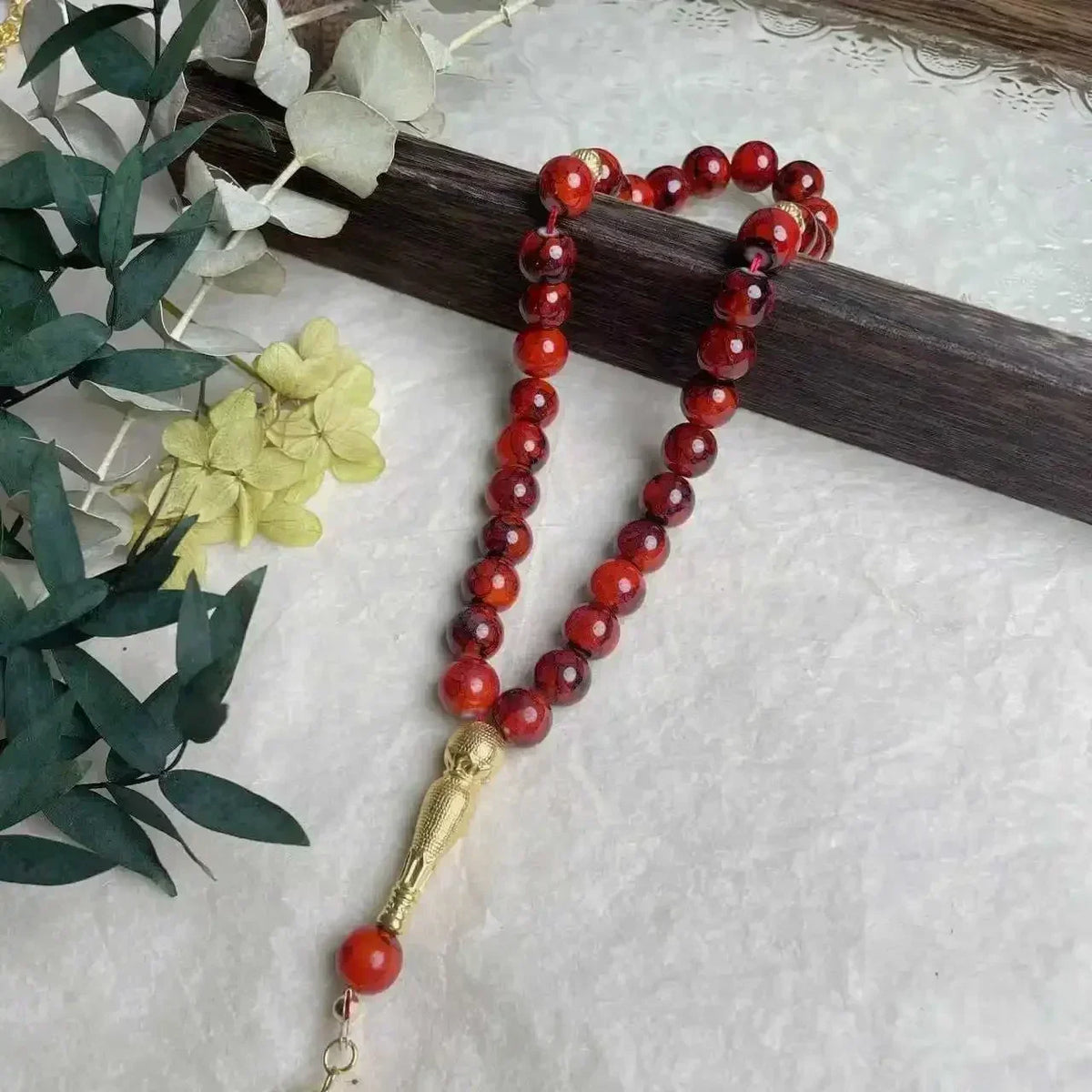 Tasbih med glasperler — 33 perler og guldkvast